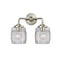 Colton Bath Vanity Light shown in the Brushed Satin Nickel finish with a Clear Halophane shade
