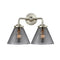 Cone Bath Vanity Light shown in the Brushed Satin Nickel finish with a Plated Smoke shade