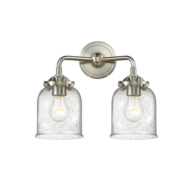 Bell Bath Vanity Light shown in the Brushed Satin Nickel finish with a Seedy shade