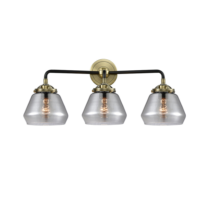 Fulton Bath Vanity Light shown in the Black Antique Brass finish with a Plated Smoke shade