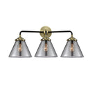 Cone Bath Vanity Light shown in the Black Antique Brass finish with a Plated Smoke shade