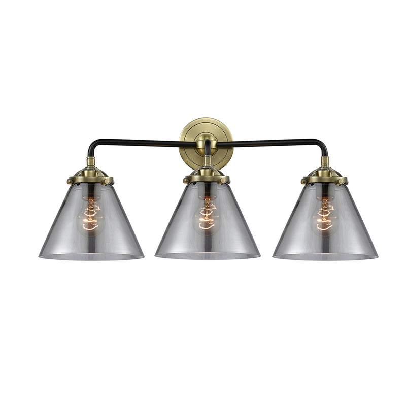 Cone Bath Vanity Light shown in the Black Antique Brass finish with a Plated Smoke shade