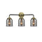 Bell Bath Vanity Light shown in the Black Antique Brass finish with a Plated Smoke shade