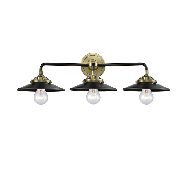 Railroad Bath Vanity Light shown in the Black Antique Brass finish with a Matte Black shade
