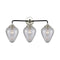 Geneseo Bath Vanity Light shown in the Black Polished Nickel finish with a Clear Crackled shade