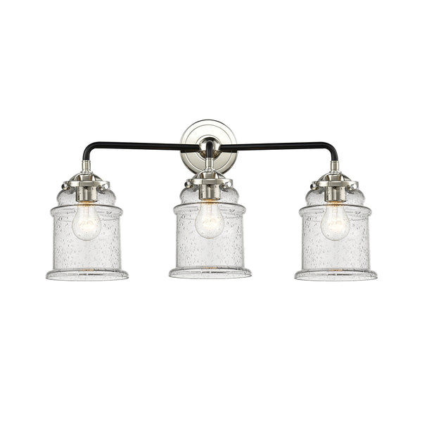 Canton Bath Vanity Light shown in the Black Polished Nickel finish with a Seedy shade