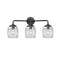Colton Bath Vanity Light shown in the Oil Rubbed Bronze finish with a Clear Halophane shade