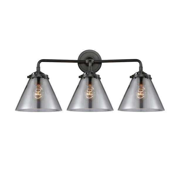 Cone Bath Vanity Light shown in the Oil Rubbed Bronze finish with a Plated Smoke shade