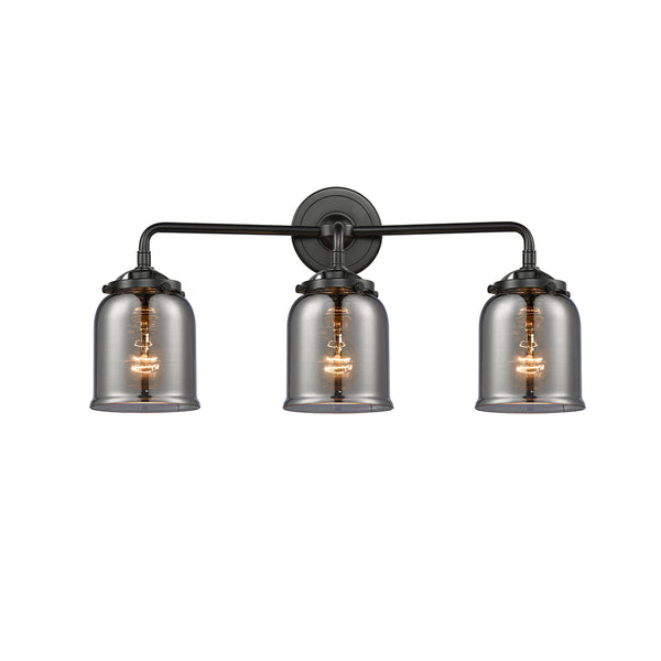 Bell Bath Vanity Light shown in the Oil Rubbed Bronze finish with a Plated Smoke shade