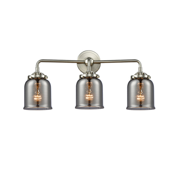 Bell Bath Vanity Light shown in the Brushed Satin Nickel finish with a Plated Smoke shade