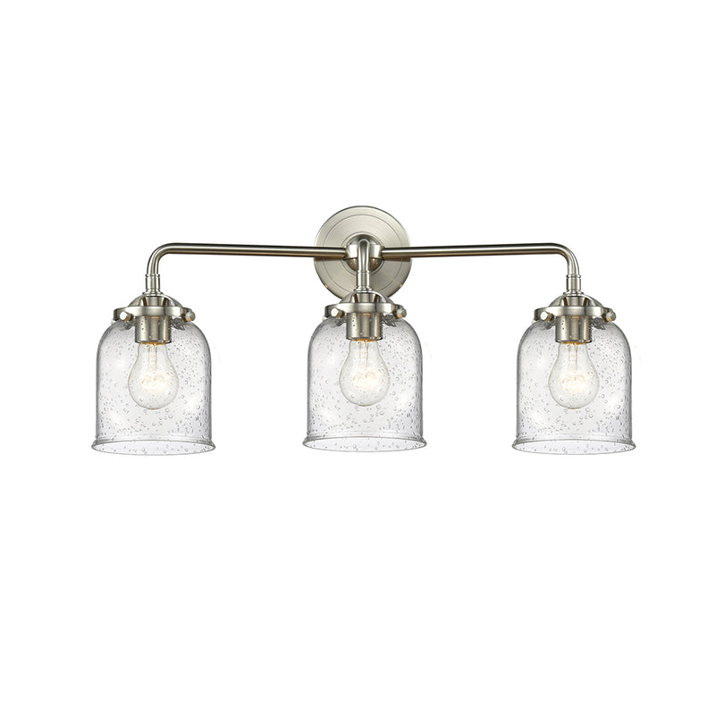 Bell Bath Vanity Light shown in the Brushed Satin Nickel finish with a Seedy shade