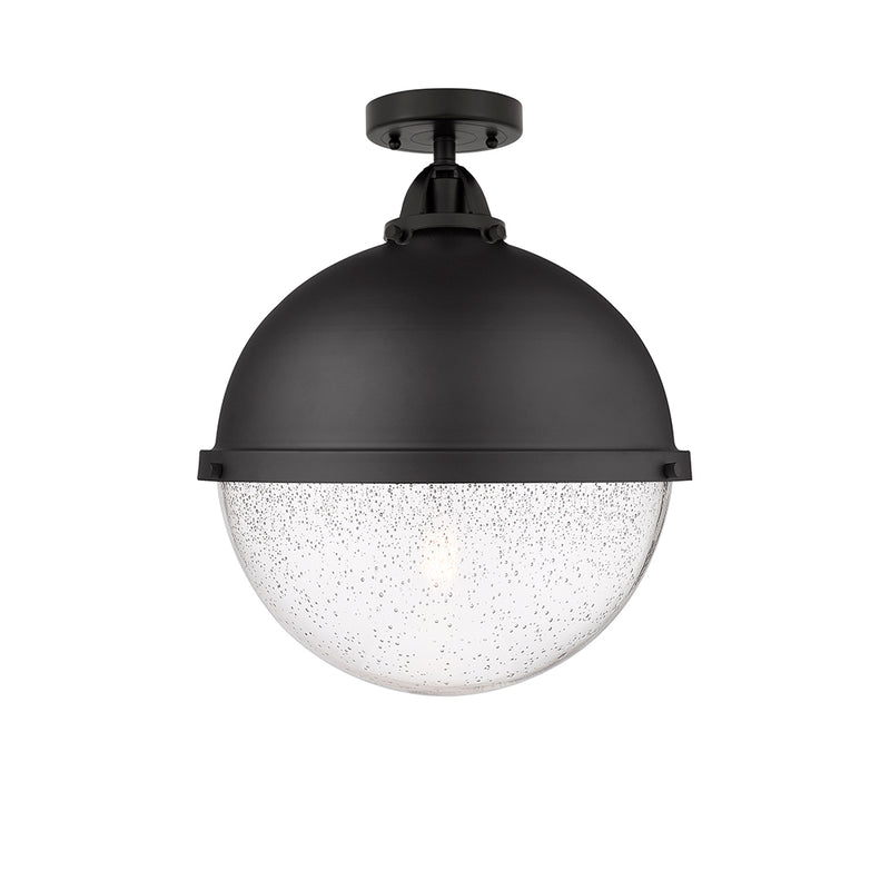 Hampden Semi-Flush Mount shown in the Matte Black finish with a Seedy shade