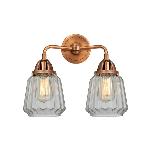 Chatham Bath Vanity Light shown in the Antique Copper finish with a Clear shade