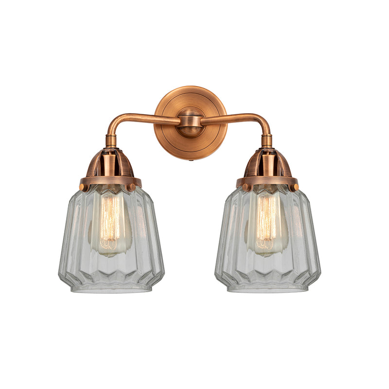 Chatham Bath Vanity Light shown in the Antique Copper finish with a Clear shade