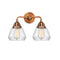 Fulton Bath Vanity Light shown in the Antique Copper finish with a Clear shade