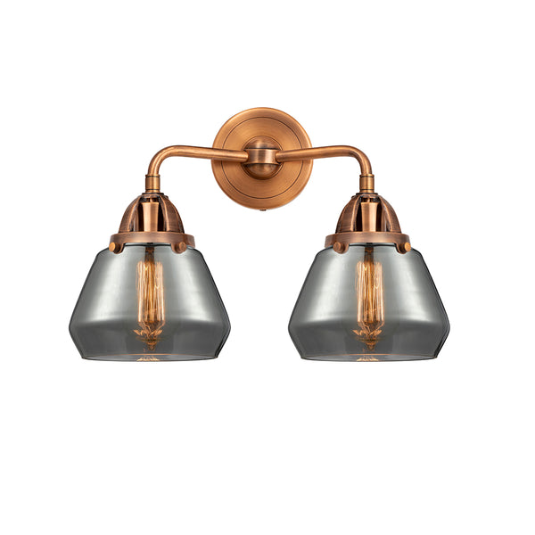 Fulton Bath Vanity Light shown in the Antique Copper finish with a Plated Smoke shade