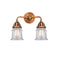 Canton Bath Vanity Light shown in the Antique Copper finish with a Clear shade