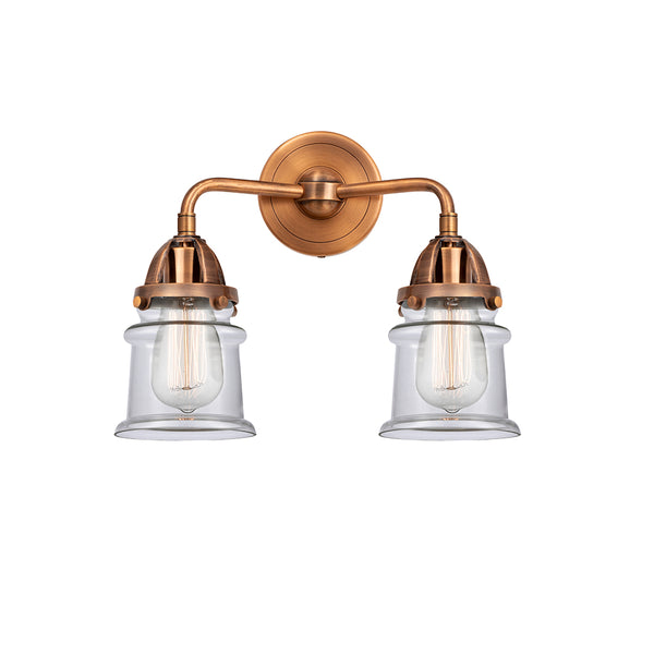 Canton Bath Vanity Light shown in the Antique Copper finish with a Clear shade