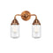 Dover Bath Vanity Light shown in the Antique Copper finish with a Seedy shade