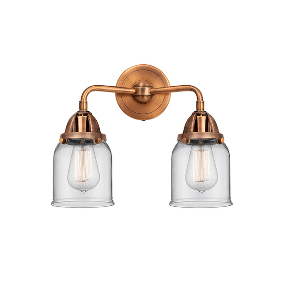 Bell Bath Vanity Light shown in the Antique Copper finish with a Clear shade
