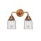 Bell Bath Vanity Light shown in the Antique Copper finish with a Clear shade