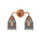 Bell Bath Vanity Light shown in the Antique Copper finish with a Plated Smoke shade
