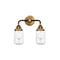 Dover Bath Vanity Light shown in the Black Antique Brass finish with a Clear shade
