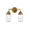 Dover Bath Vanity Light shown in the Brushed Brass finish with a Seedy shade