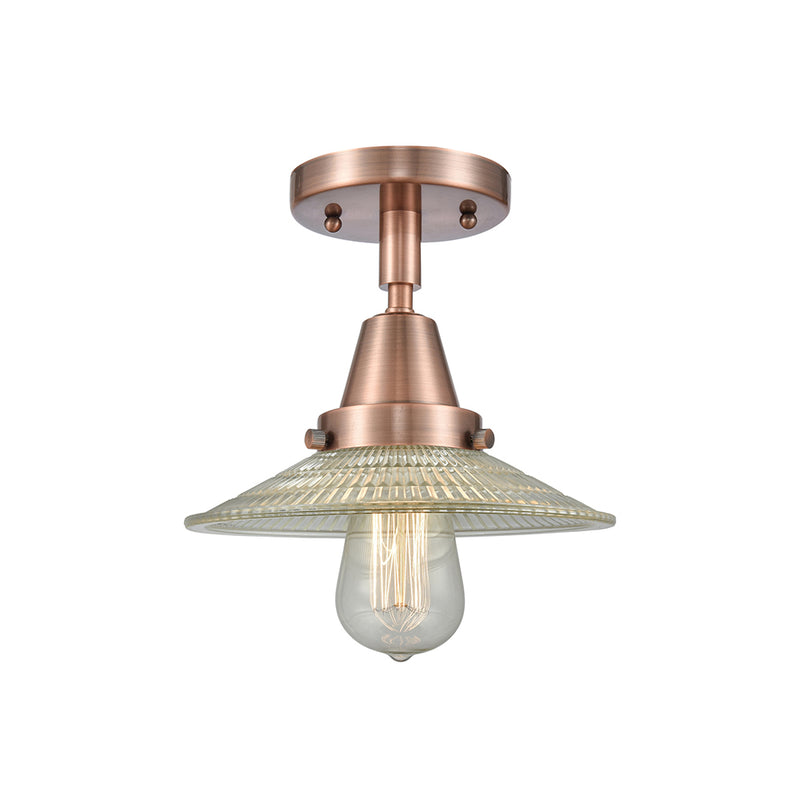 Halophane Flush Mount shown in the Antique Copper finish with a Clear Halophane shade