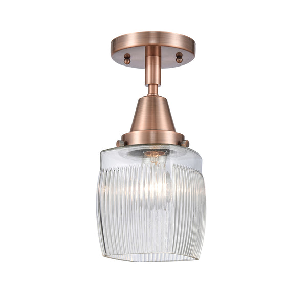 Colton Flush Mount shown in the Antique Copper finish with a Clear Halophane shade