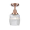Colton Flush Mount shown in the Antique Copper finish with a Clear Halophane shade