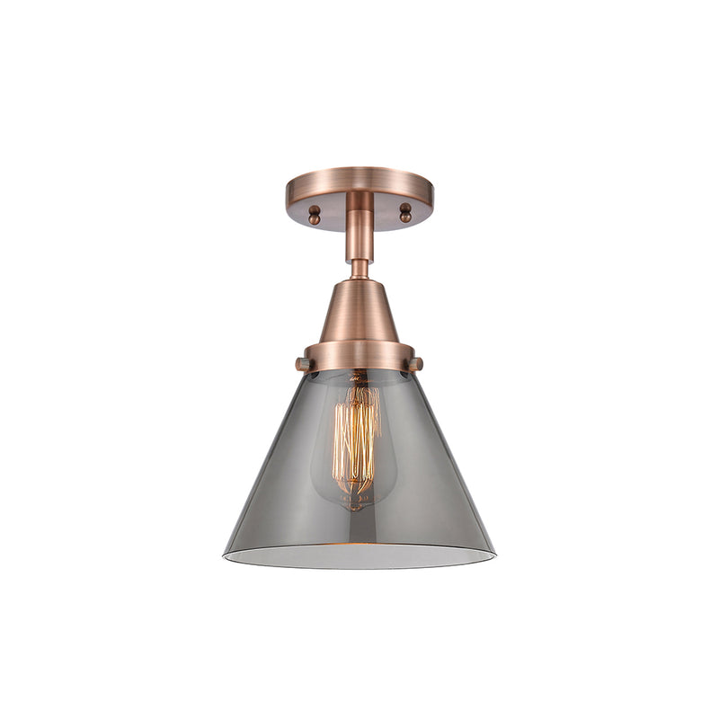 Cone Flush Mount shown in the Antique Copper finish with a Plated Smoke shade