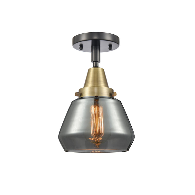 Fulton Flush Mount shown in the Black Antique Brass finish with a Plated Smoke shade