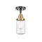 Dover Flush Mount shown in the Black Antique Brass finish with a Seedy shade