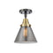 Cone Flush Mount shown in the Black Antique Brass finish with a Plated Smoke shade