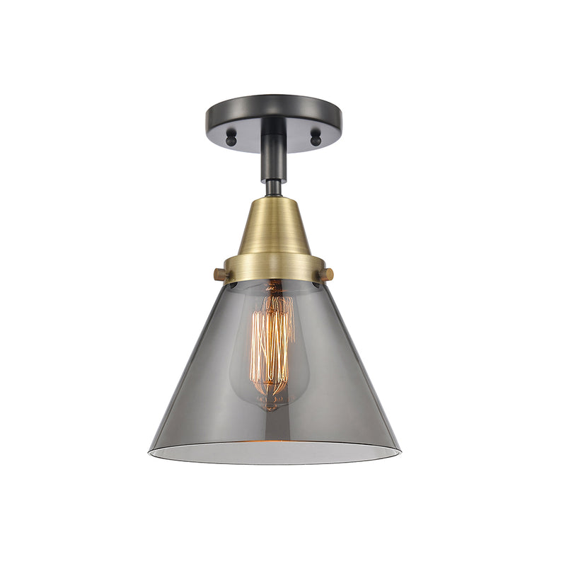 Cone Flush Mount shown in the Black Antique Brass finish with a Plated Smoke shade