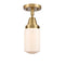 Dover Flush Mount shown in the Brushed Brass finish with a Matte White shade