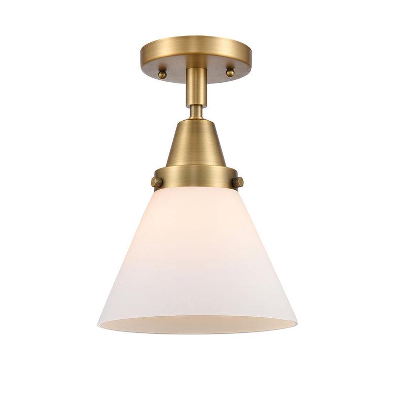 Cone Flush Mount shown in the Brushed Brass finish with a Matte White shade