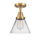 Cone Flush Mount shown in the Brushed Brass finish with a Clear shade