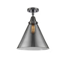 Cone Flush Mount shown in the Matte Black finish with a Plated Smoke shade