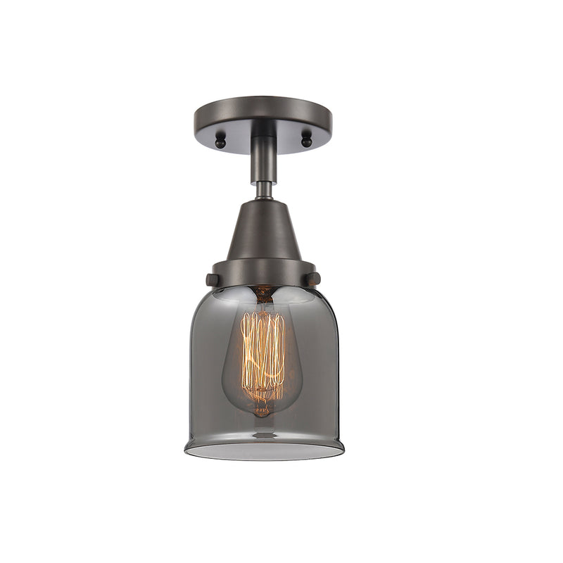 Bell Flush Mount shown in the Oil Rubbed Bronze finish with a Plated Smoke shade