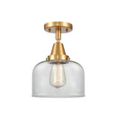 Bell Flush Mount shown in the Satin Gold finish with a Clear shade