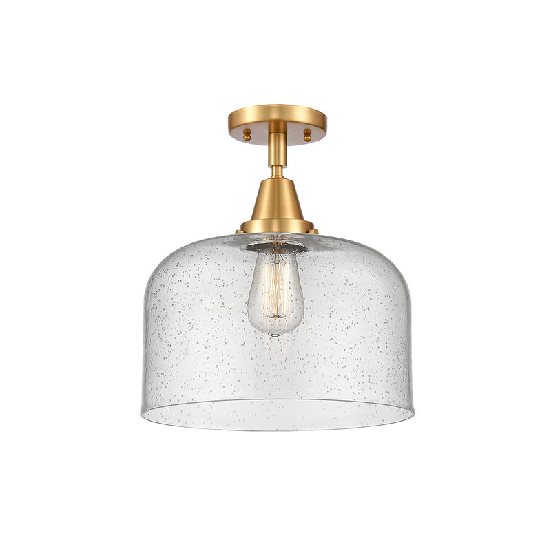 Bell Flush Mount shown in the Satin Gold finish with a Seedy shade