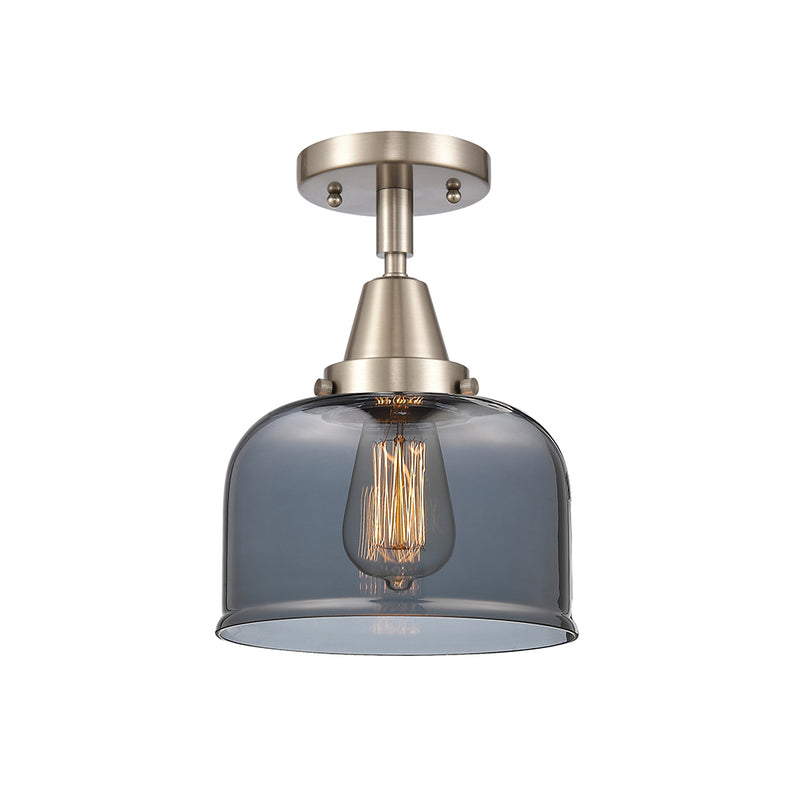 Bell Flush Mount shown in the Brushed Satin Nickel finish with a Plated Smoke shade