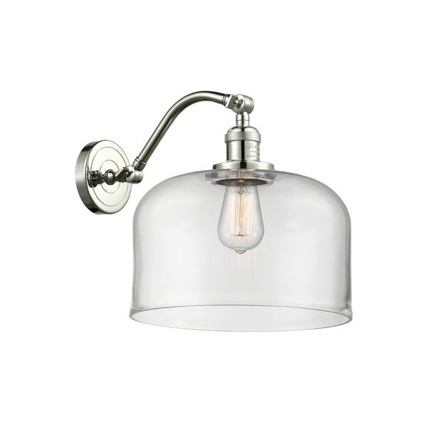 Bell Sconce shown in the Polished Nickel finish with a Clear shade