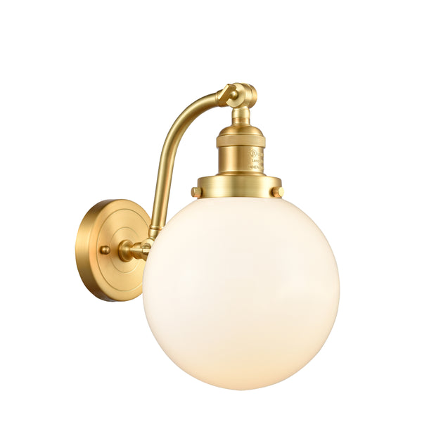 Beacon Sconce shown in the Satin Gold finish with a Matte White shade