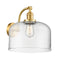 Bell Sconce shown in the Satin Gold finish with a Clear shade