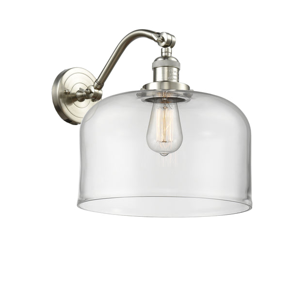 Bell Sconce shown in the Brushed Satin Nickel finish with a Clear shade
