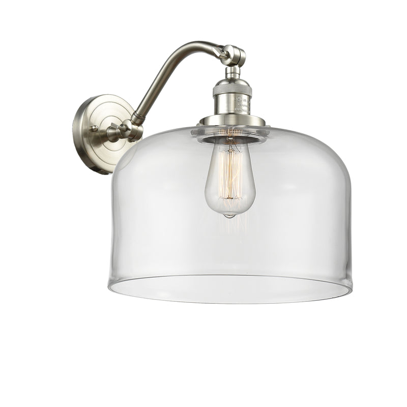 Bell Sconce shown in the Brushed Satin Nickel finish with a Clear shade