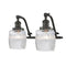 Colton Bath Vanity Light shown in the Oil Rubbed Bronze finish with a Clear Halophane shade